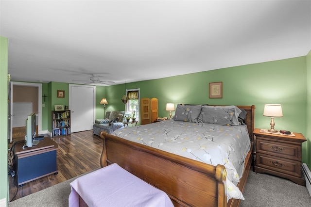 2410 Bruynswick Rd, Wallkill, NY 12589 - bedroom featuring a ceiling fan, baseboard heating, and wood finished floors