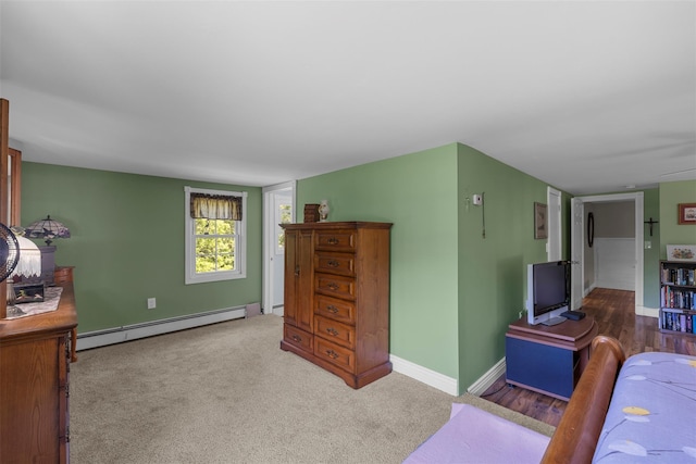 2410 Bruynswick Rd, Wallkill, NY 12589 - living room with baseboard heating, baseboards, and carpet floors