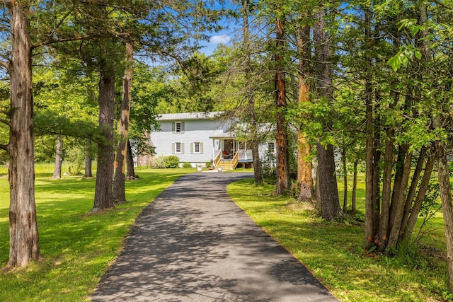 2410 Bruynswick Rd, Wallkill, NY 12589 - view of front of house with a front lawn and asphalt driveway