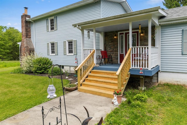 2410 Bruynswick Rd, Wallkill, NY 12589 - view of front of house with covered porch, a front yard, and a chimney
