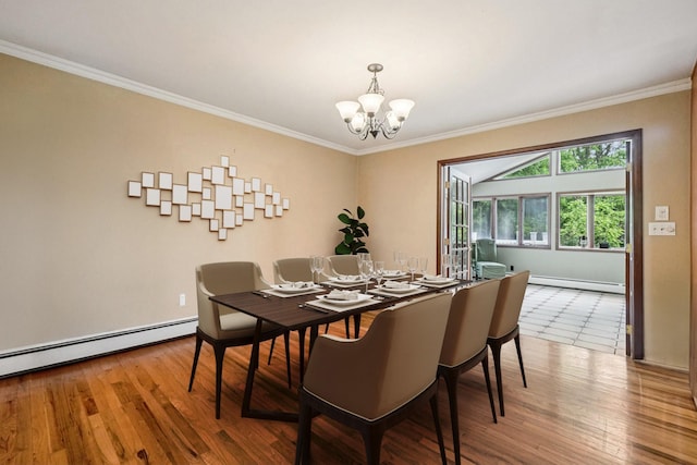26 Crown Hill Rd, Wappingers Falls, NY 12590 - dining room featuring a baseboard radiator, a chandelier, crown molding, and wood finished floors
