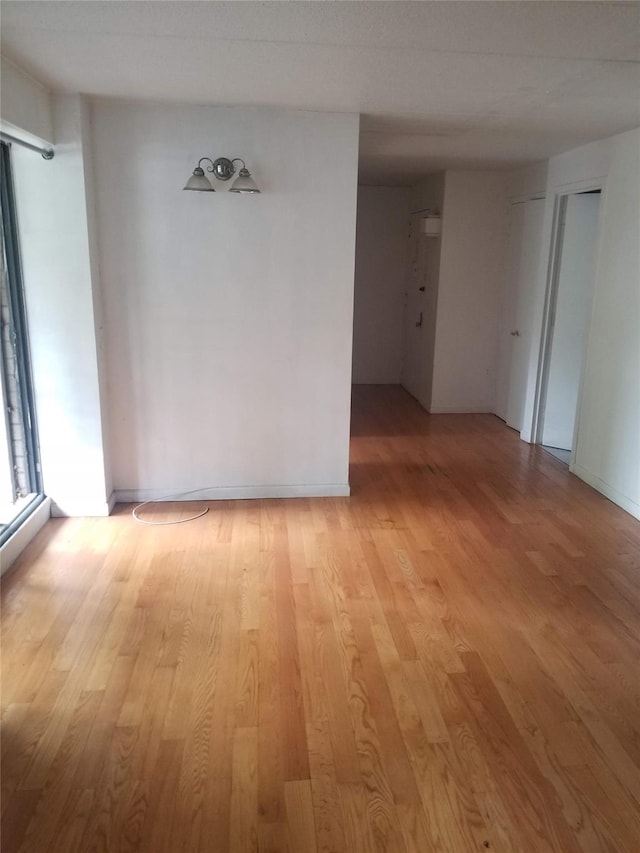 134-46 Maple Ave Unit 1C, Flushing, NY 11355 - empty room featuring light wood-style flooring