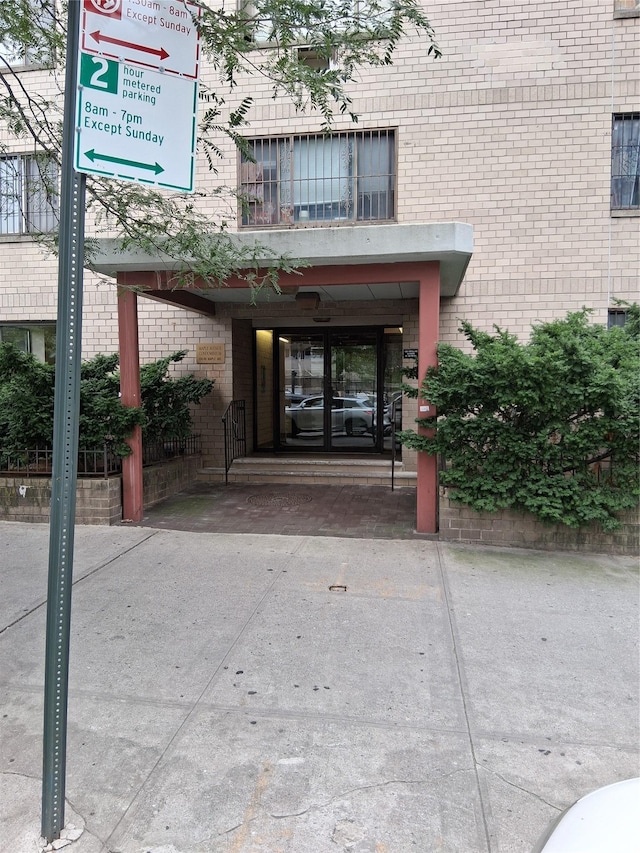 134-46 Maple Ave Unit 1C, Flushing, NY 11355 - view of exterior entry with brick siding