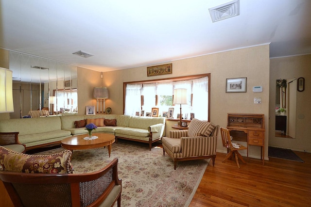 1318 Brooklyn Blvd, Bay Shore, NY 11706 - living room with wood finished floors and ornamental molding
