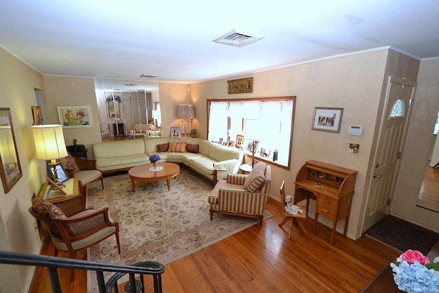 1318 Brooklyn Blvd, Bay Shore, NY 11706 - living room featuring wood finished floors and ornamental molding