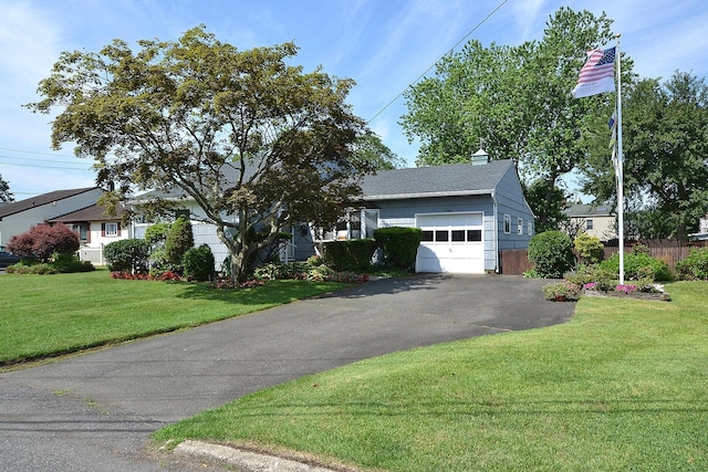 1318 Brooklyn Blvd, Bay Shore, NY 11706 - view of front of property with a garage, driveway, a front yard, and a shingled roof