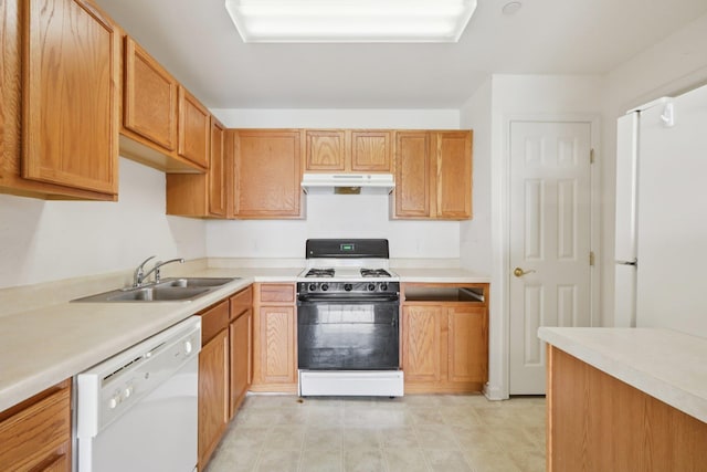 1080 Maggie Rd Unit 12-9, Newburgh, NY 12550 - kitchen featuring white appliances, under cabinet range hood, a sink, and light countertops