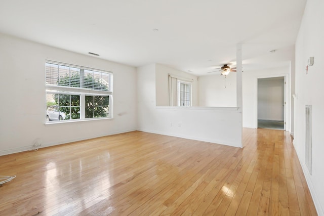 1080 Maggie Rd Unit 12-9, Newburgh, NY 12550 - spare room with plenty of natural light, light wood-style floors, a ceiling fan, and baseboards
