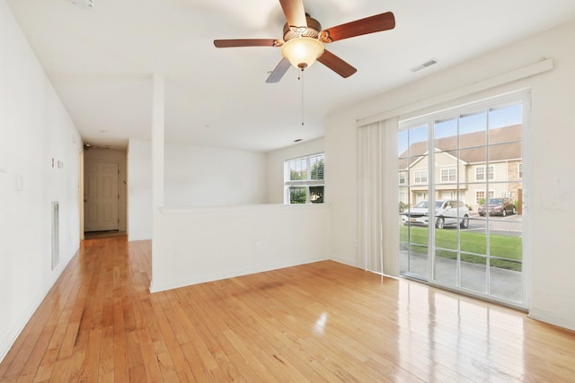 1080 Maggie Rd Unit 12-9, Newburgh, NY 12550 - unfurnished room featuring light wood-style flooring, a ceiling fan, and baseboards