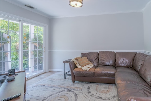 15 Candlestick Ct, Warwick, NY 10990 - living room featuring wood finished floors, crown molding, and baseboards
