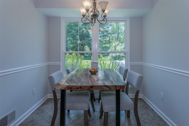 15 Candlestick Ct, Warwick, NY 10990 - tiled dining room featuring a chandelier, plenty of natural light, and baseboards