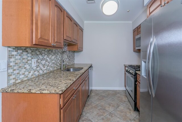 15 Candlestick Ct, Warwick, NY 10990 - kitchen with stainless steel appliances, a sink, ornamental molding, backsplash, and light stone counters