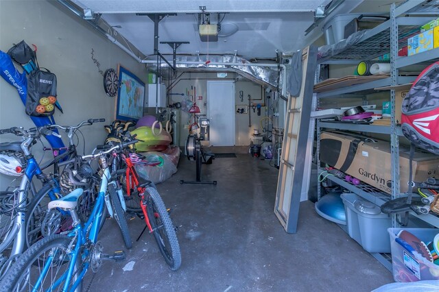 15 Candlestick Ct, Warwick, NY 10990 - garage with a garage door opener and water heater