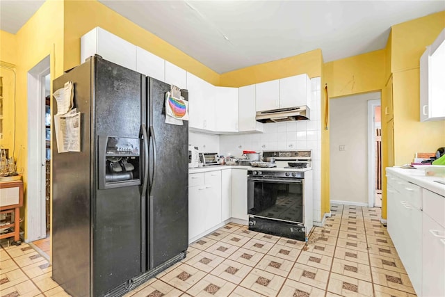 11480 178th Pl, Addisleigh Park, NY 11434 - kitchen featuring black refrigerator with ice dispenser, gas range, under cabinet range hood, white cabinets, and light countertops