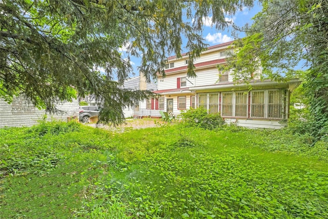 11480 178th Pl, Addisleigh Park, NY 11434 - rear view of property featuring a sunroom