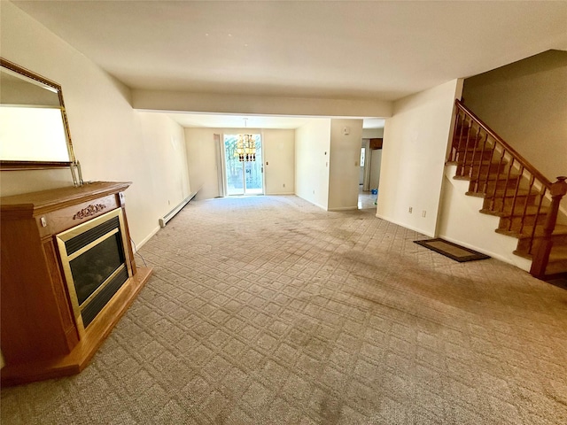 281 Union Ave, New Windsor, NY 12553 - unfurnished living room with carpet, baseboard heating, stairs, a glass covered fireplace, and baseboards