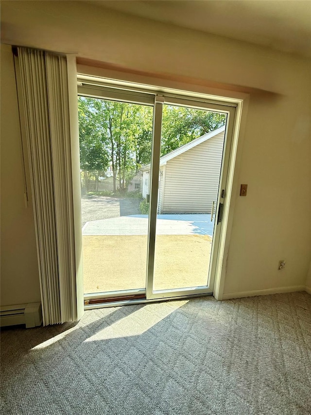 281 Union Ave, New Windsor, NY 12553 - doorway with carpet floors and baseboard heating
