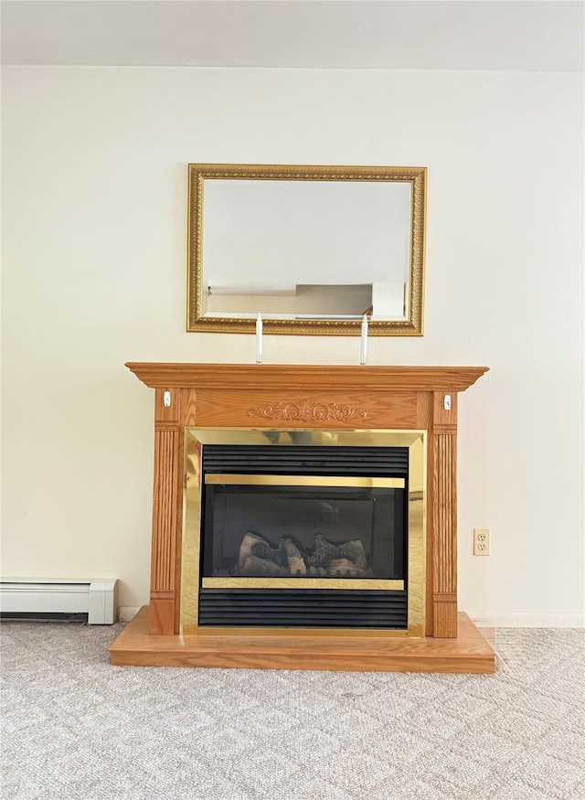 281 Union Ave, New Windsor, NY 12553 - detailed view of a glass covered fireplace, carpet floors, and a baseboard radiator