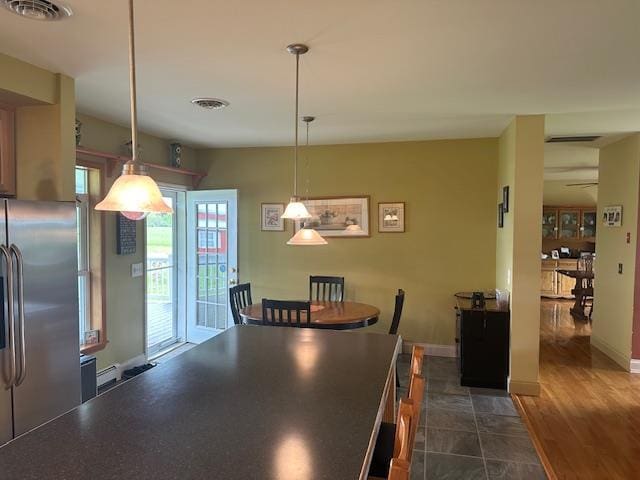 6452 State Route 52, Lake Huntington, NY 12752 - dining room featuring dark wood-style floors and baseboards