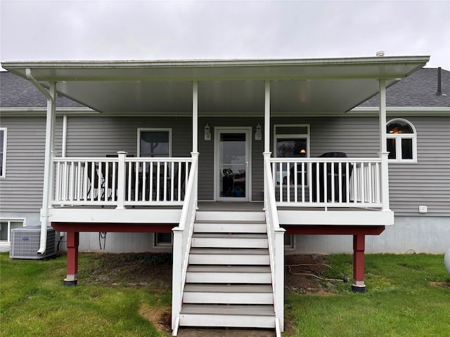 6452 State Route 52, Lake Huntington, NY 12752 - rear view of property with a porch, roof with shingles, stairs, and a lawn