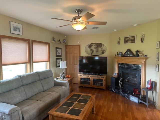6452 State Route 52, Lake Huntington, NY 12752 - living room with ceiling fan, wood finished floors, and a fireplace