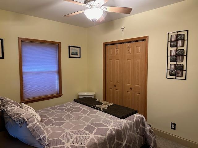 6452 State Route 52, Lake Huntington, NY 12752 - bedroom featuring a closet, ceiling fan, and carpet floors