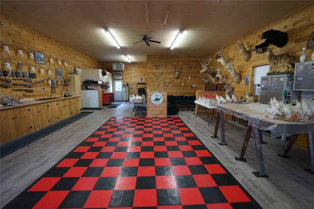 6452 State Route 52, Lake Huntington, NY 12752 - misc room featuring wood walls, a ceiling fan, wood finished floors, and a workshop area