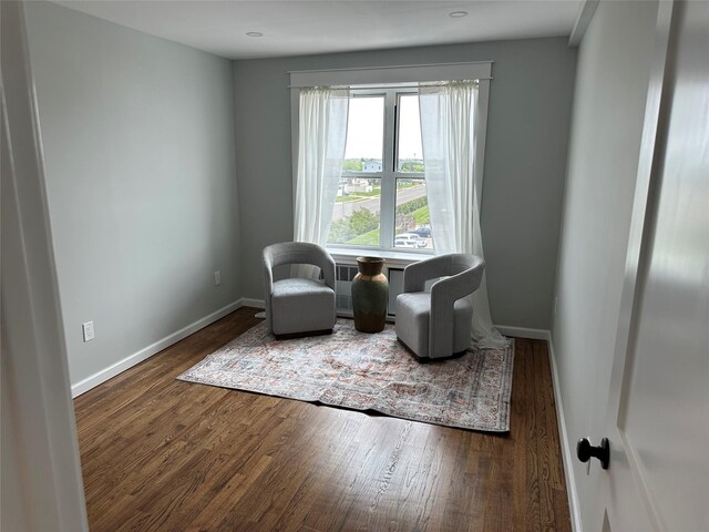 855 E Broadway Unit 3D, Long Beach, NY 11561 - living area featuring wood finished floors and baseboards