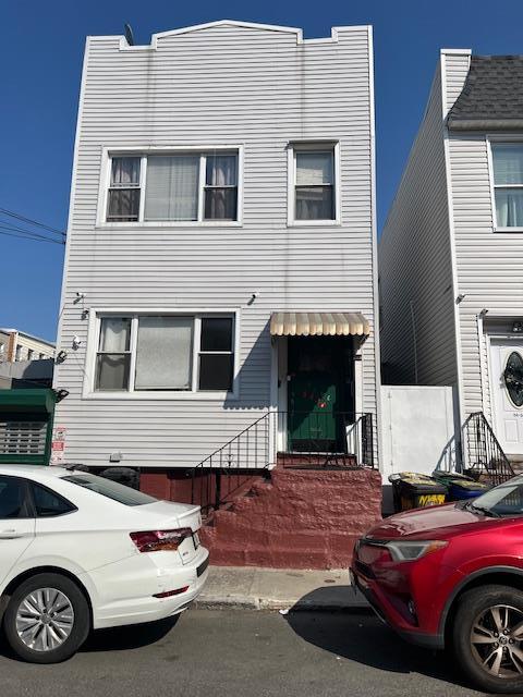 5436 Nurge Ave, Maspeth, NY 11378 - townhome / multi-family property featuring entry steps