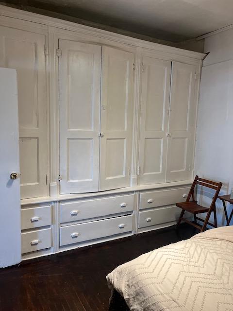 5436 Nurge Ave, Maspeth, NY 11378 - bedroom featuring dark wood finished floors and a closet