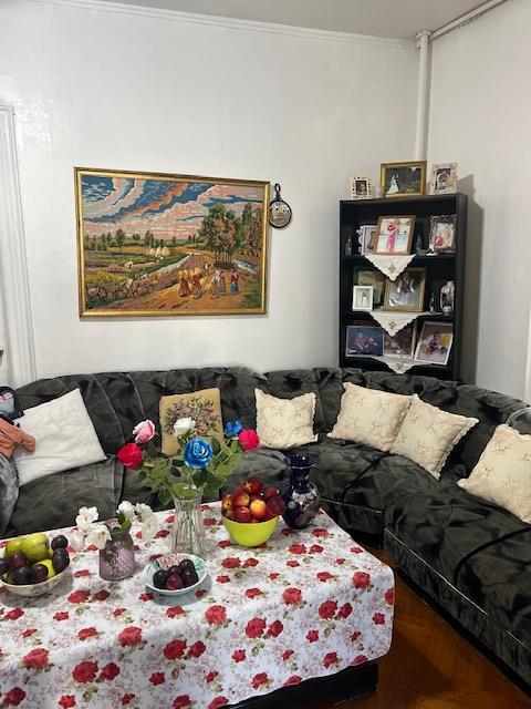 5436 Nurge Ave, Maspeth, NY 11378 - living area with crown molding
