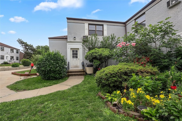 67-09 136th St Unit B, Kew Garden Hills, NY 11367 - view of front of property with brick siding and a front yard