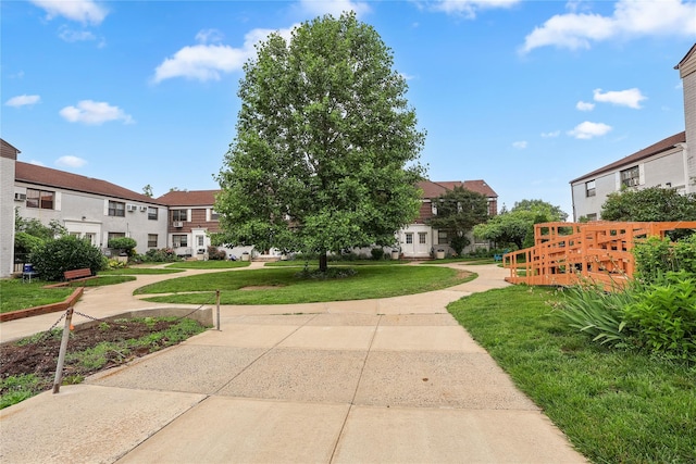 67-09 136th St Unit B, Kew Garden Hills, NY 11367 - surrounding community featuring a residential view and a yard