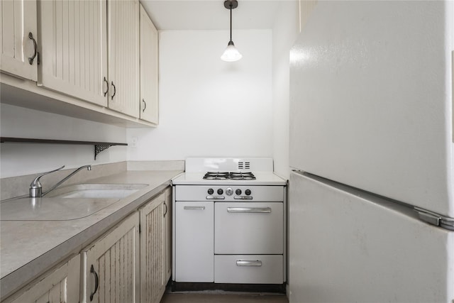 67-09 136th St Unit B, Kew Garden Hills, NY 11367 - kitchen with white appliances, light countertops, and decorative light fixtures