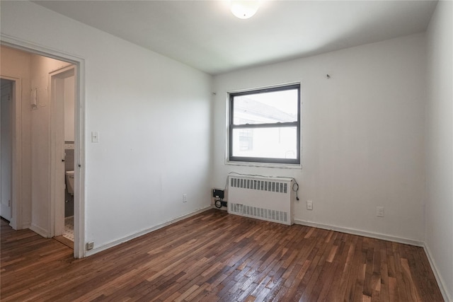 67-09 136th St Unit B, Kew Garden Hills, NY 11367 - unfurnished room featuring radiator heating unit and wood finished floors