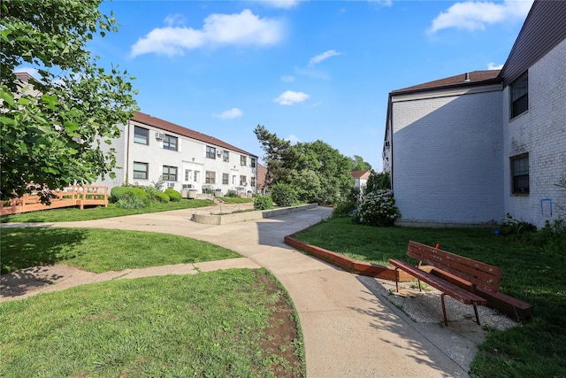 67-09 136th St Unit B, Kew Garden Hills, NY 11367 - surrounding community with a yard