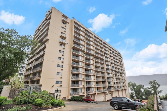 1155 Warburton Ave Unit 4G, Yonkers, NY 10701 - view of apartment building / complex with uncovered parking