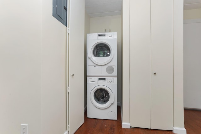 1155 Warburton Ave Unit 4G, Yonkers, NY 10701 - washroom featuring stacked washer / drying machine and dark wood-type flooring