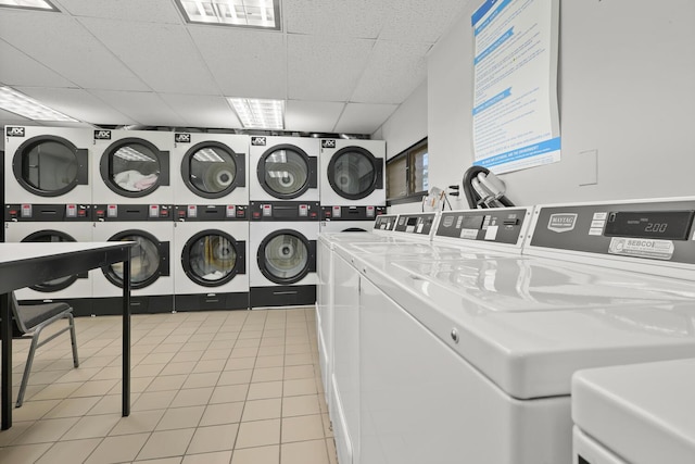 1155 Warburton Ave Unit 4G, Yonkers, NY 10701 - shared laundry featuring estacked washer and dryer, washing machine and dryer, and light tile patterned floors