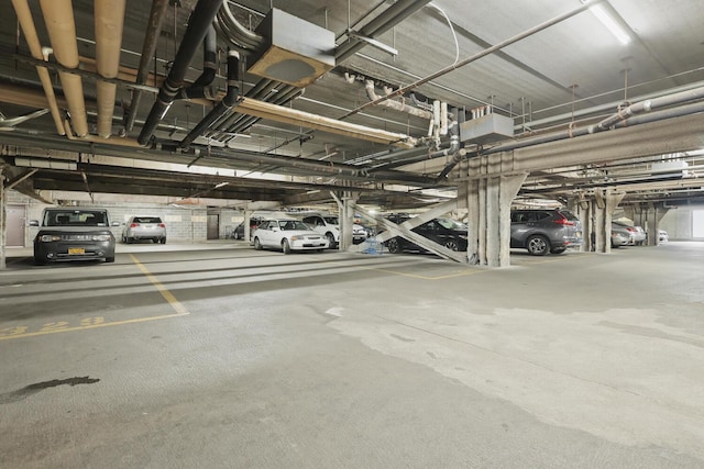 1155 Warburton Ave Unit 4G, Yonkers, NY 10701 - parking deck featuring a garage door opener