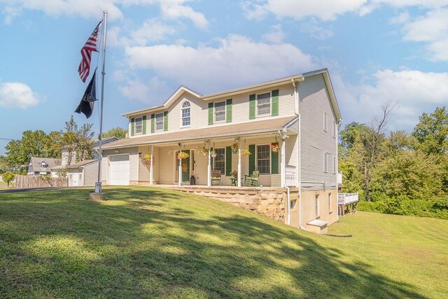 2 Joseph St, West Haverstraw, NY 10993 - view of front of property with a porch and a front yard