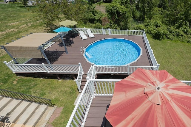 2 Joseph St, West Haverstraw, NY 10993 - view of pool featuring a wooden deck and a lawn