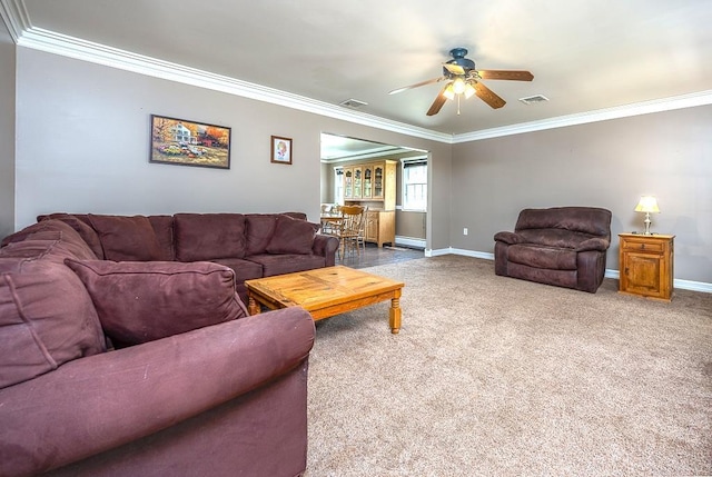 2 Joseph St, West Haverstraw, NY 10993 - carpeted living room featuring ornamental molding, ceiling fan, baseboards, and a baseboard heating unit