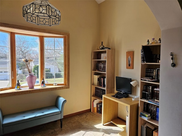 526 Hazel Dr, Woodmere, NY 11598 - office area with baseboards and stone finish flooring