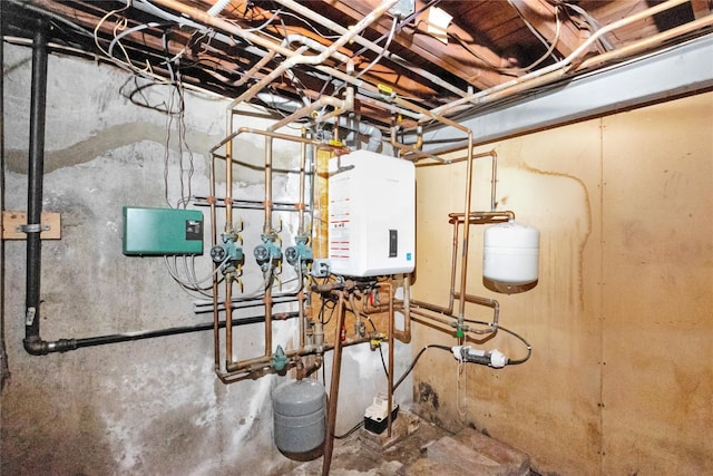 53 Wiltshire Dr, Commack, NY 11725 - utility room featuring tankless water heater