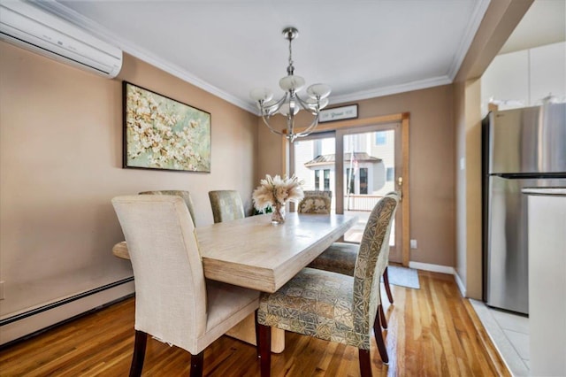 22 Cheshire Rd, Inwood, NY 11096 - dining area with a wall mounted AC, a chandelier, a baseboard heating unit, ornamental molding, and light wood-type flooring