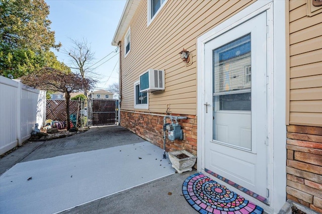 22 Cheshire Rd, Inwood, NY 11096 - property entrance with a patio