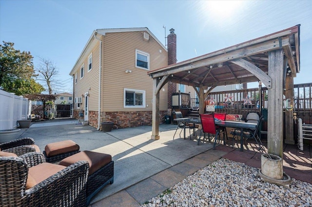 22 Cheshire Rd, Inwood, NY 11096 - fenced backyard with a gazebo and a patio