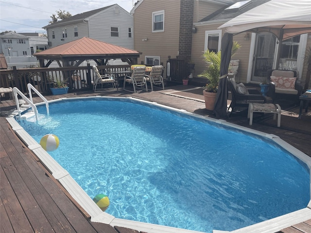 22 Cheshire Rd, Inwood, NY 11096 - swimming pool featuring a gazebo and a deck