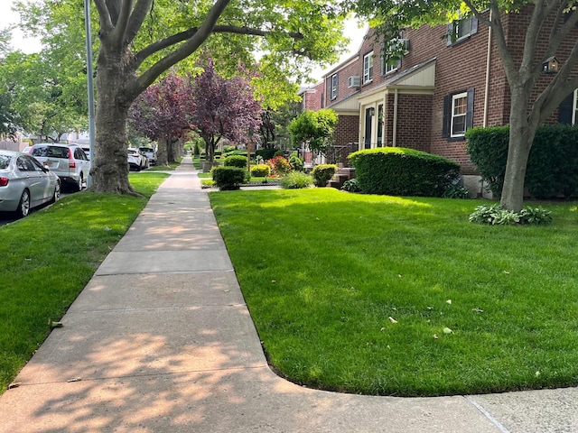 210-12 69th Ave Lower, Lower, Oakland Gardens, NY 11364 - view of community featuring a yard